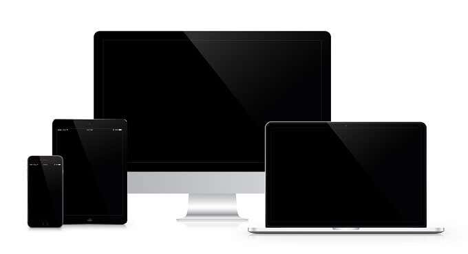 A set of Apple devices with black screens 