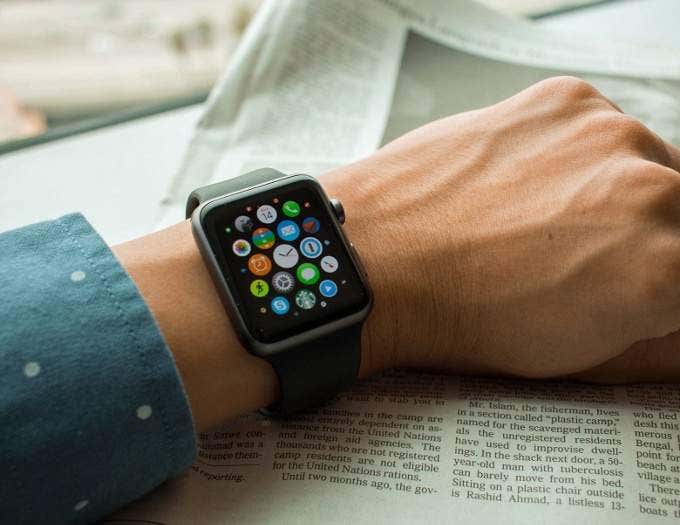 The wrist of someone wearing an Apple Watch 